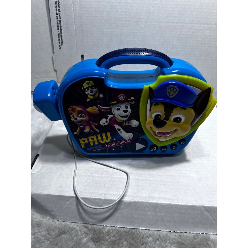 Paw Patrol is on a Roll song along boombox with microphone